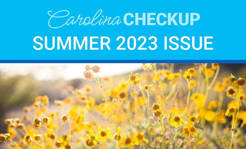 A close up of yellow flowers with the words " carolina checkup summer 2 0 2 3 issues ".